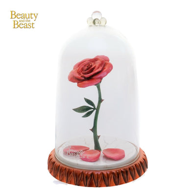 A beautifully crafted Enchanted Rose Statue from the Beauty and the Beast Collection, featuring iconic characters and moments from the Disney classic. Handmade with fine china, includes limited-edition pieces celebrating this enchanted tale.