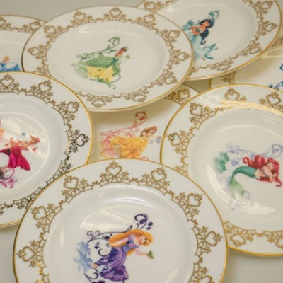 Disney Collector’s Plates – 6-inch fine bone china collectables featuring Princesses, Frozen, Alice in Wonderland, Disney 100, Villains, and Mickey & Minnie.