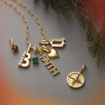 Seven Gold Charms & Pendant with Diamonds, Birthstones, and Pearls. Available from online jewellery store Jewels of St Leon Australia
