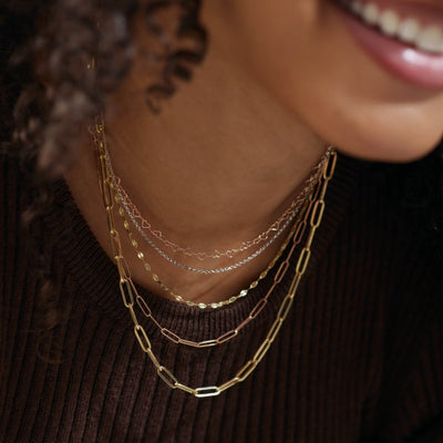 A selection of high quality gold chains for women, from dainty to statement chains. Easy to layer or wear as standalone chains, find premium quality gold chains.