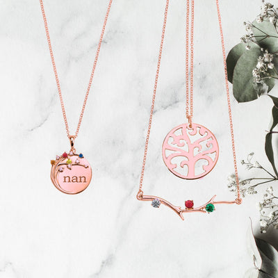 Elevate your style with our Women's Rose Gold Necklace Collection, featuring a tree of life, family birthstone branch, and engraved family necklaces.