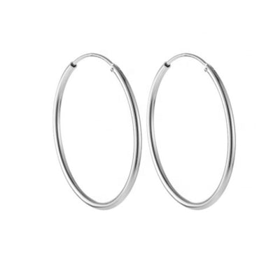 Close-up of 1.5mm x 20mm Sterling Silver hinged endless hoop earrings on a white background. 