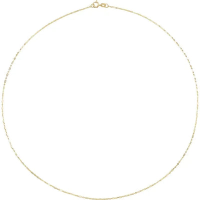 The 50 cm, 1.25 mm Figaro chain coiled into a perfect circle to highlight its smooth drape, uniform lustre and flexibility—crafted in solid 14 kt yellow gold as part of the 302 Utility Collection.