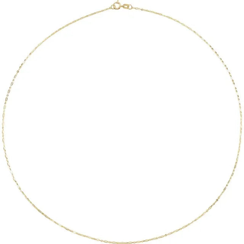 The 50 cm, 1.25 mm Figaro chain coiled into a perfect circle to highlight its smooth drape, uniform lustre and flexibility—crafted in solid 14 kt yellow gold as part of the 302 Utility Collection.