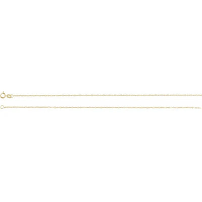 Macro view of the signature 3 + 1 Figaro pattern—three elongated links followed by one smaller link—on the 1.25 mm solid 14 kt yellow gold chain, revealing its polished finish and meticulous link work.