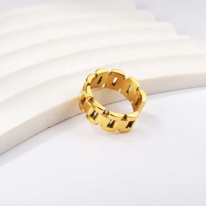 A stylish and versatile modern gold ring. A contemporary 18K gold-plated stainless steel bracelet-style ring with an 8mm width.