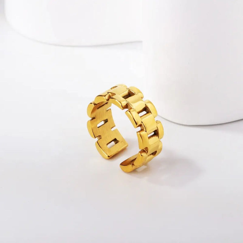 A stylish and versatile modern gold ring. 8mm bracelet-style ring in 18K Gold Plated Stainless Steel.