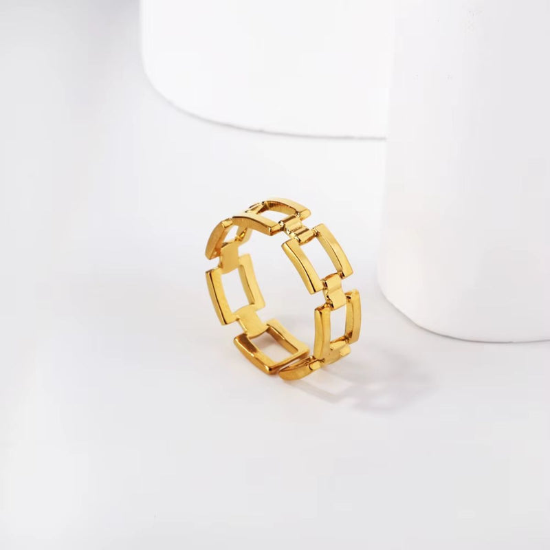 A stylish 18K gold-plated stainless steel adjustable wide chain link ring with a bold, open-link design.