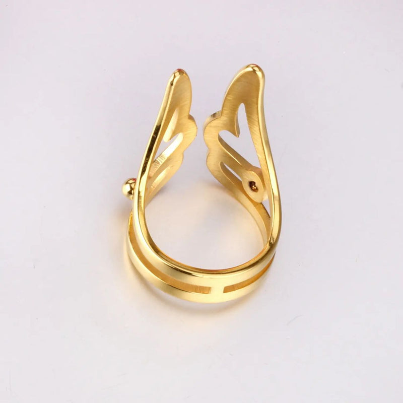 an elegant and intricate wing design measuring 28x20mm overall. Crafted from 18K gold-plated stainless steel, this beautifully detailed piece adds a touch of sophistication to any look. Lightweight yet durable, it is the perfect statement ring for women&