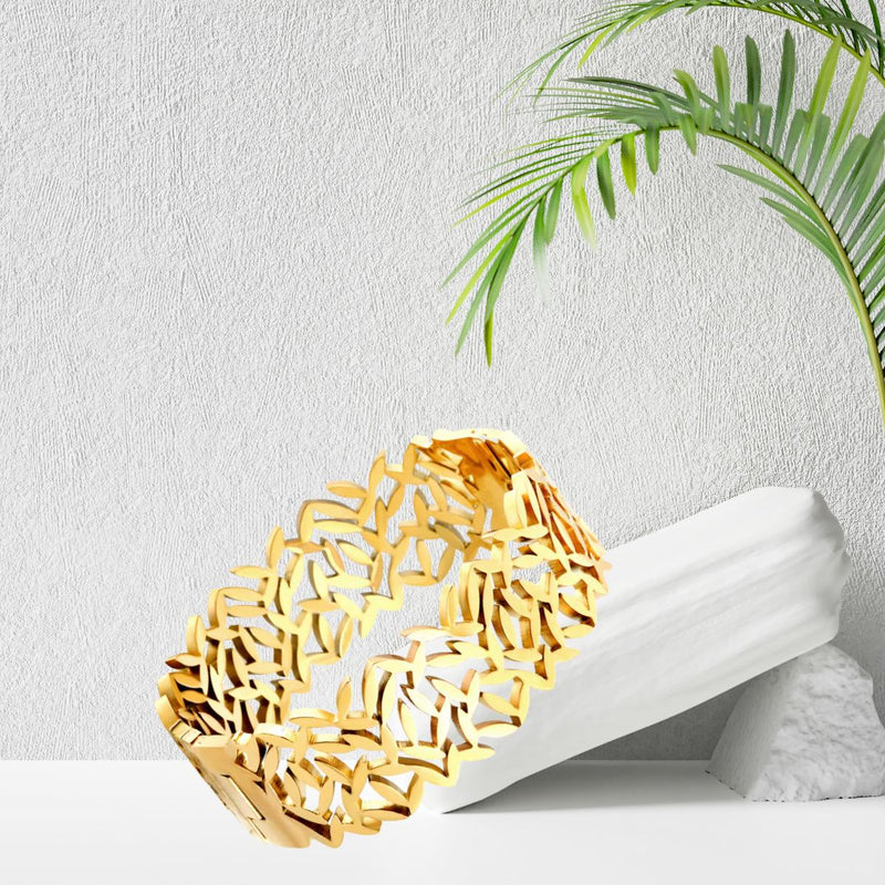 Close-up of the ornate filigree pattern, highlighting its craftsmanship and lightweight comfort. 18K Gold Plated Stainless Steel for a durable and longer lasting shine.