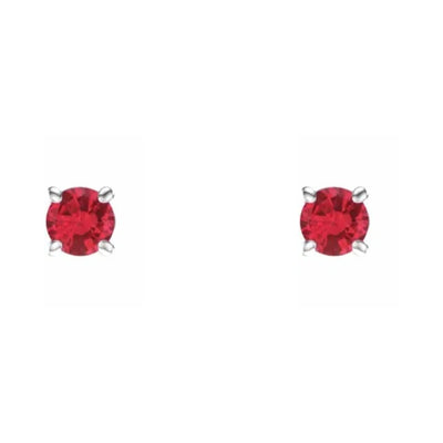 Behold the allure of our 2.5mm natural ruby earrings in a four prong setting, expertly fashioned from 14kt white gold. The front-facing image highlights the radiant splendour of the rubies, making a captivating statement. Shop gold earrings in Australia from Jewels of St Leon.