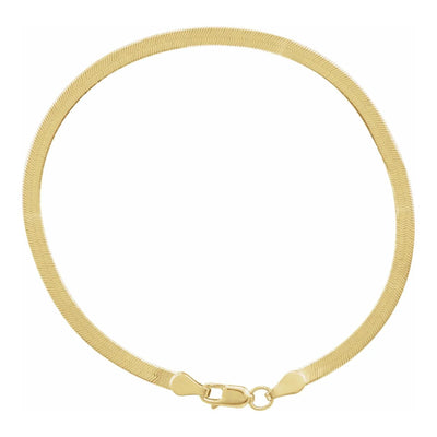 The 2.8mm wide Herringbone Snake Chain Bracelet, available in 14kt Yellow Gold. Add a touch of sophisication and elegance to any outfit either as a standalone bracelet or layer with other bracelets to create a unique look. Add versatility with this gold ladies bracelet. 