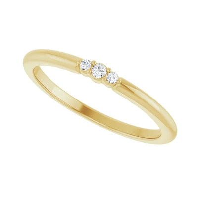 Introducing our dainty 3-Stone Natural Diamond Stackable Ring. Crafted from 14kt Yellow Gold, this ring is ideal for creating a curated ring stack or wearing it as a standalone ring. This diamond ring for women is the perfect fashion accessory for work, special occasions, or a night out on the town.&nbsp;