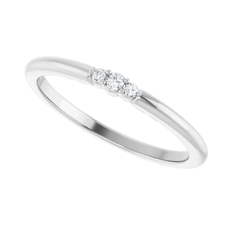 Introducing our dainty Natural Diamond Stackable Ring with three stones. Crafted from sleek rhodium-plated 14kt White Gold, this ring is an ideal choice as a standalone ring or worn while creating your own curated ring stack. This diamond ring for women is the perfect fashion accessory for work, special occasions, or a night out on the town.