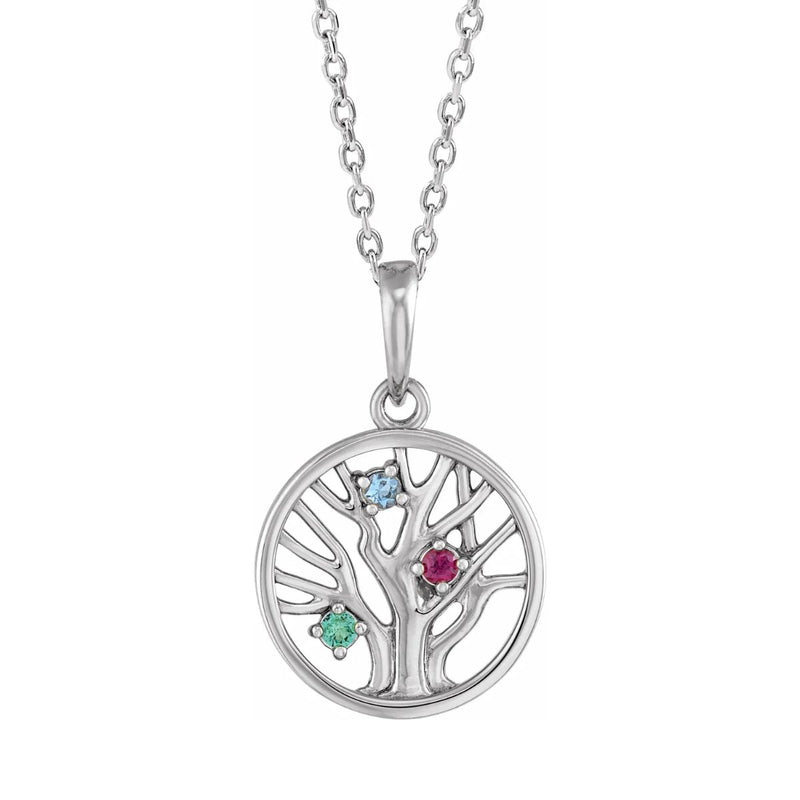 Introducing our exquisite Three Stone Family Tree of Life Necklace, available in your choice of 14kt yellow, white, or rose gold. This enchanting necklace features a beautifully crafted tree of life pendant adorned with three intertwined birthstones, symbolising the cherished bond of family and love.