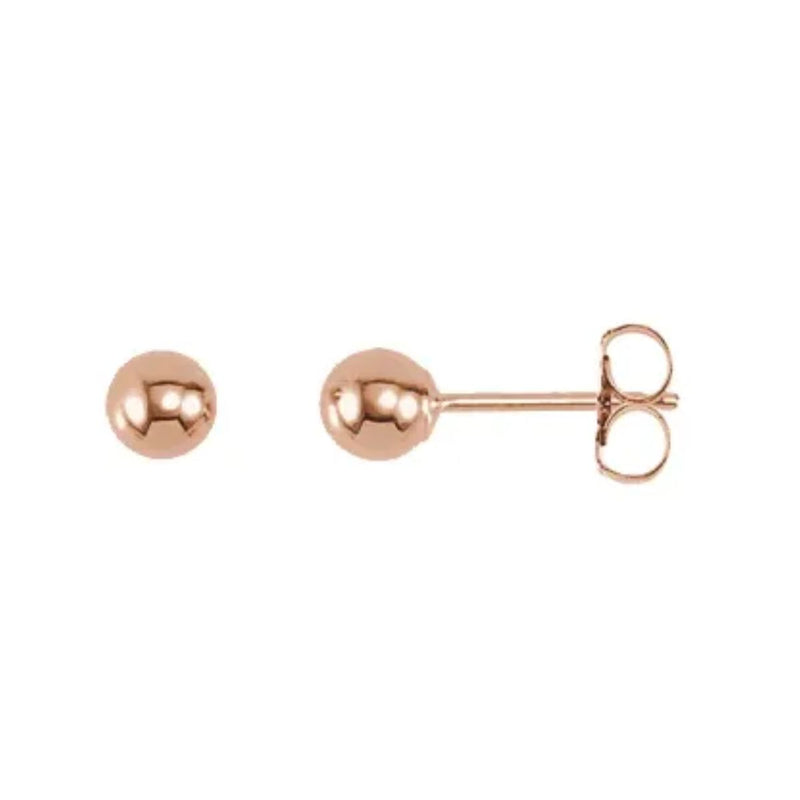 Our 4mm Bright Finish Ball Earrings in 14K Rose Gold are the ultimate accessory to complement any outfit. These classic stud earrings are perfect for both men and women, providing a stylish and timeless look suitable for all. The bright finish of the earrings adds a touch of luxury, making them perfect for formal occasions or daily wear. Shop Now at Jewels of St Leon.