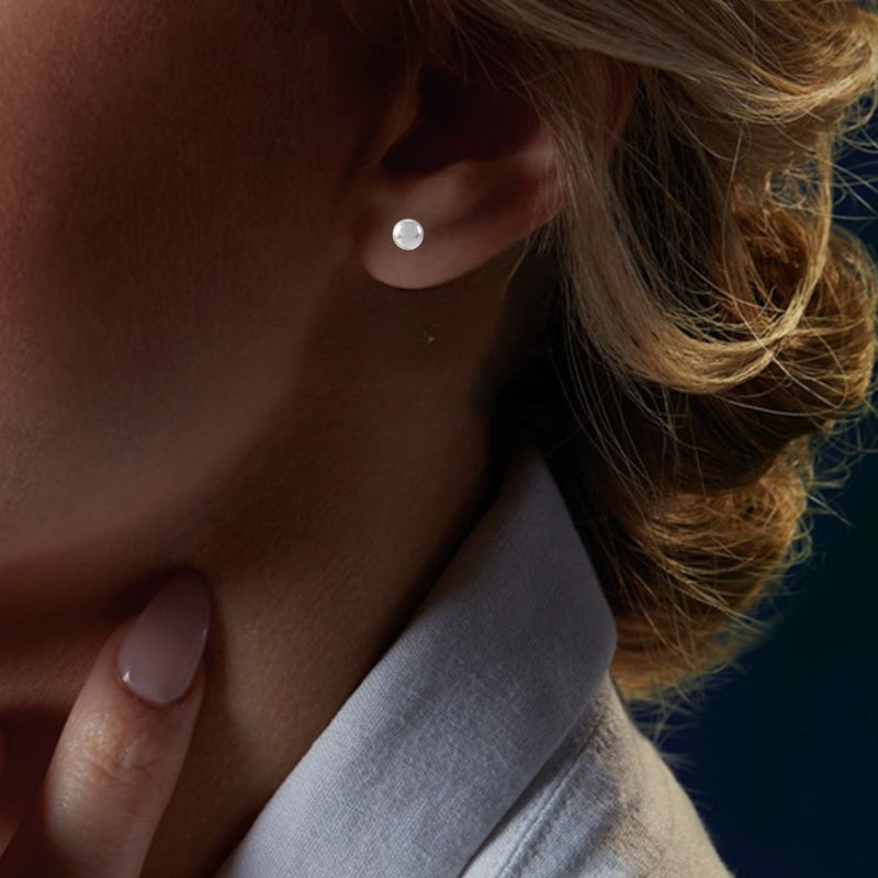 Get the ultimate accessory: 4mm Bright Finish Ball Earrings in 14K White Gold. These classic stud earrings are perfect for both men & women, providing a stylish & timeless look. Shop at Jewels of St Leon.