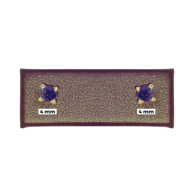 Elegant 4mm Natural Blue Sapphire Earrings in 14K Yellow Gold displayed with a 4mm tag beneath, emphasizing the gemstone’s size and beauty. Perfectly crafted, these earrings are ideal for everyday elegance. Available at Jewels of St Leon. Shop now.