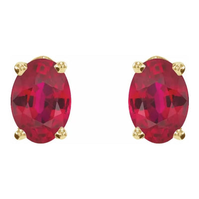 6x4mm Oval Natural Ruby Stud Earrings in 14kt Yellow Gold