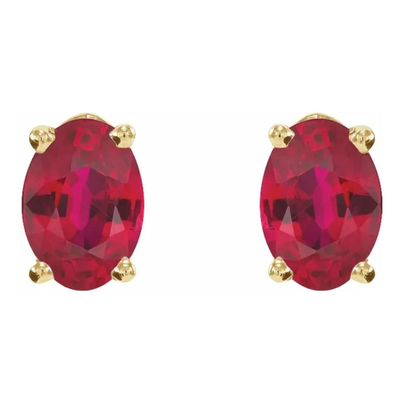 6x4mm Oval Natural Ruby Stud Earrings in 14kt Yellow Gold