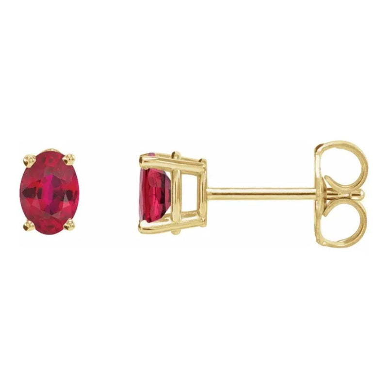 6x4mm Oval Natural Ruby Stud Earrings in 14kt Yellow Gold