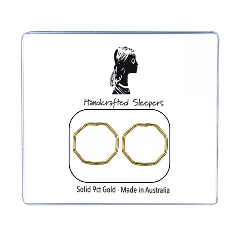 The packaging showcases the 12mm Octagonal Shaped Sleepers in 9ct Solid Gold, elegantly presented with the text "Handcrafted Sleepers, 9ct solid gold - Made in Australia" prominently displayed. The Octagonal design is subtly visible, hinting at the intricate craftsmanship within. Shop hoop and sleeper earrings from Jewels of St Leon.