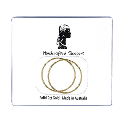 Pair of 20mm solid 9ct gold sleeper earrings displayed in branded packaging with silhouette logo, handcrafted and made in Australia for everyday wear.