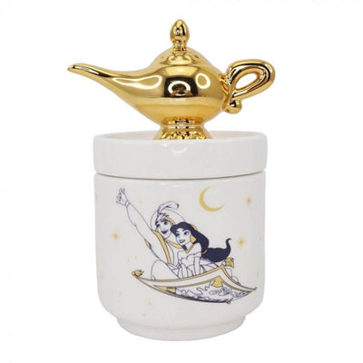 A stunning view of the Disney Aladdin Collector Box, showcasing the detailed gold Genie’s lamp on the lid and intricate illustration of Aladdin and Jasmine soaring through the starry night on a flying carpet.