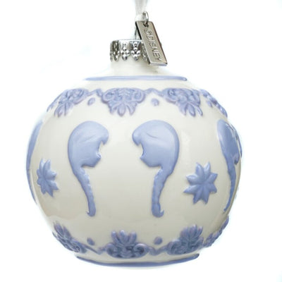 White fine bone china Anna ornament with raised pale-purple silhouette and floral embossed accents