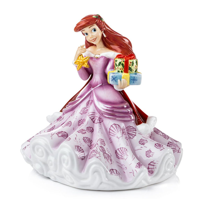 a gorgeous figurine that captures our festive spirits beautifully while keeping her classic look. The Ariel Christmas figurine is hand-crafted by our team of prestigious craftsmen who have many years of experience within the industry; this limited edition piece is strictly limited to only 1,000 pieces worldwide.