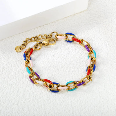 Vibrant multi-coloured enamel bracelet with oval chain links, 17cm+3cm extension, lobster clasp, perfect for layering or solo wear.