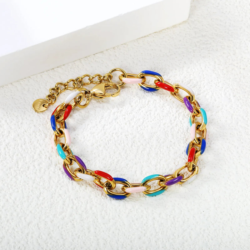 Vibrant multi-coloured enamel bracelet with oval chain links, 17cm+3cm extension, lobster clasp, perfect for layering or solo wear.