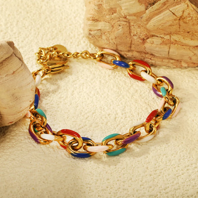 A colourful enamel bracelet featuring vibrant Red, Purple, Blue, Teal, Light Pink, or White hues, with oval chain links and a secure lobster clasp.