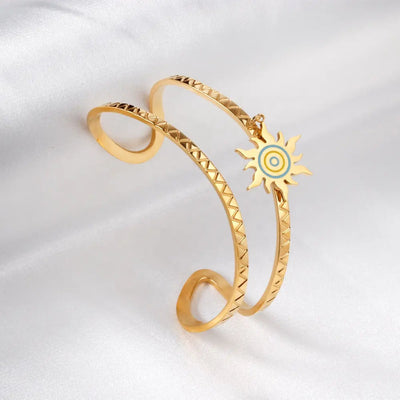  Close-up of the intricate sun pendant, showcasing its textured finish and durable craftsmanship.