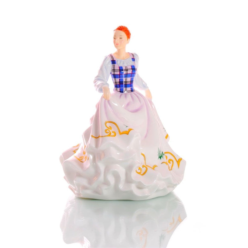 The Bonnie Lass figurine from the Celtic Ladies Collection is a stunning tribute to Scotland. Handcrafted from fine bone china, it features a tartan bodice and skirt adorned with the Scottish thistle, embodying the beauty of the highlands. Available from Jewels of St Leon.