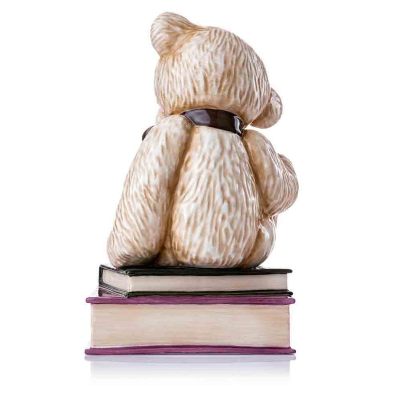 An angled rear perspective captures the graceful curve of the figurine&