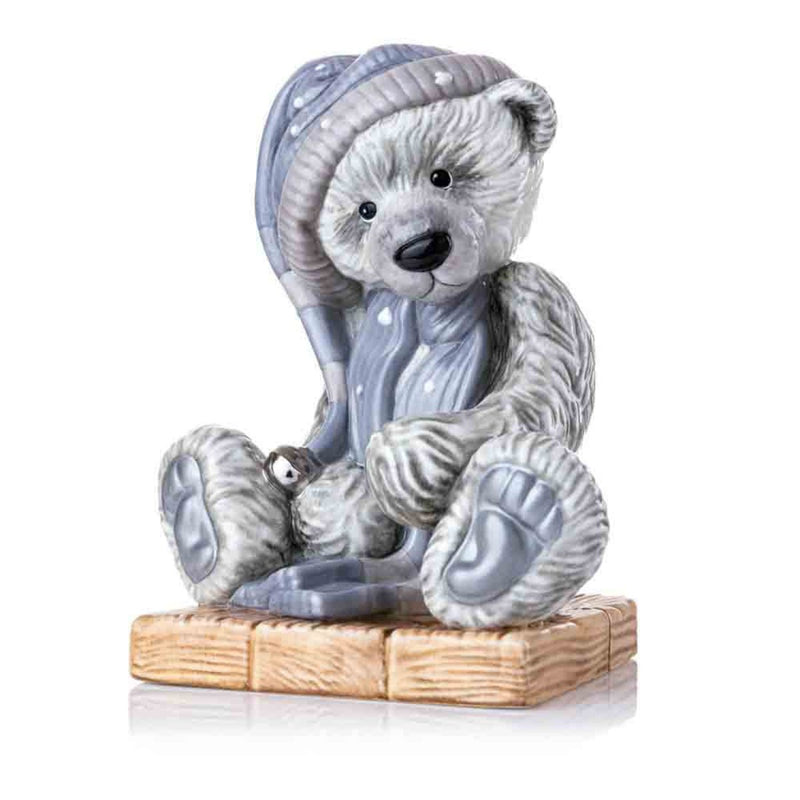 A charming view of Frost, the beloved Charlie Bear, crafted in fine bone china. Frost&