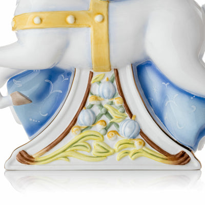 Close-up of decorative pumpkin and vine detailing on Cinderella enchanted horse figurine base