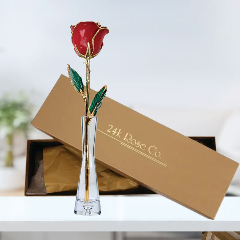 Gift set – Classic Red lacquered rose with 24ct gold trim beside glass vase.