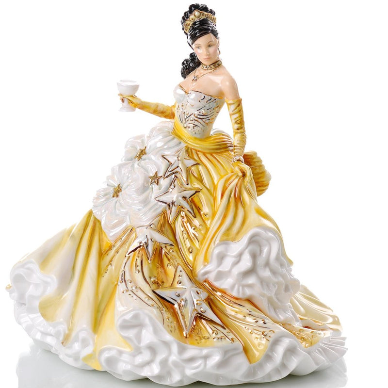 Front angle of Congratulations Gold figurine holding chalice, golden gown flowing with 22ct gold detail
