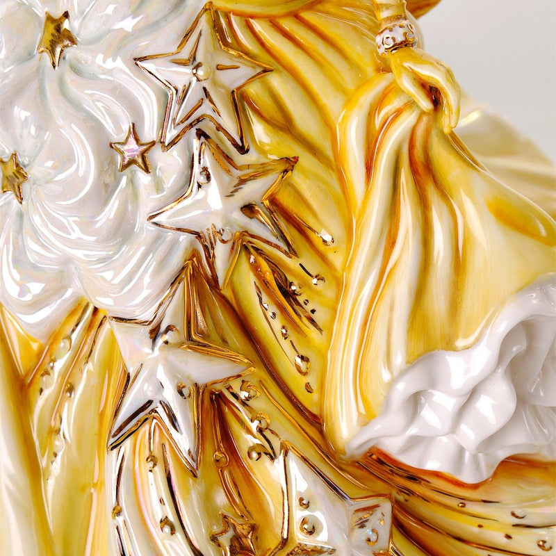 Close-up of Congratulations Gold figurine showing 22ct gold stars and mother-of-pearl detailing
