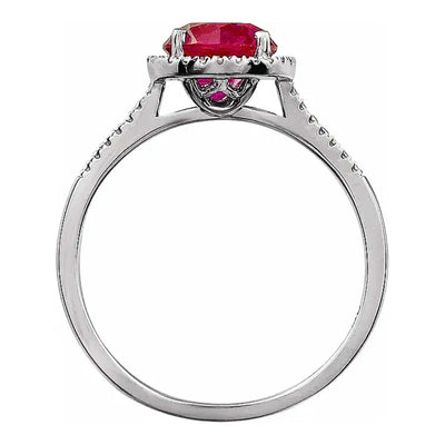 Side view of our lab-created ruby and beaded halo with diamond accents, shows the quality of this birthstone ring in Sterling Silver. Available from Jewels of St Leon.