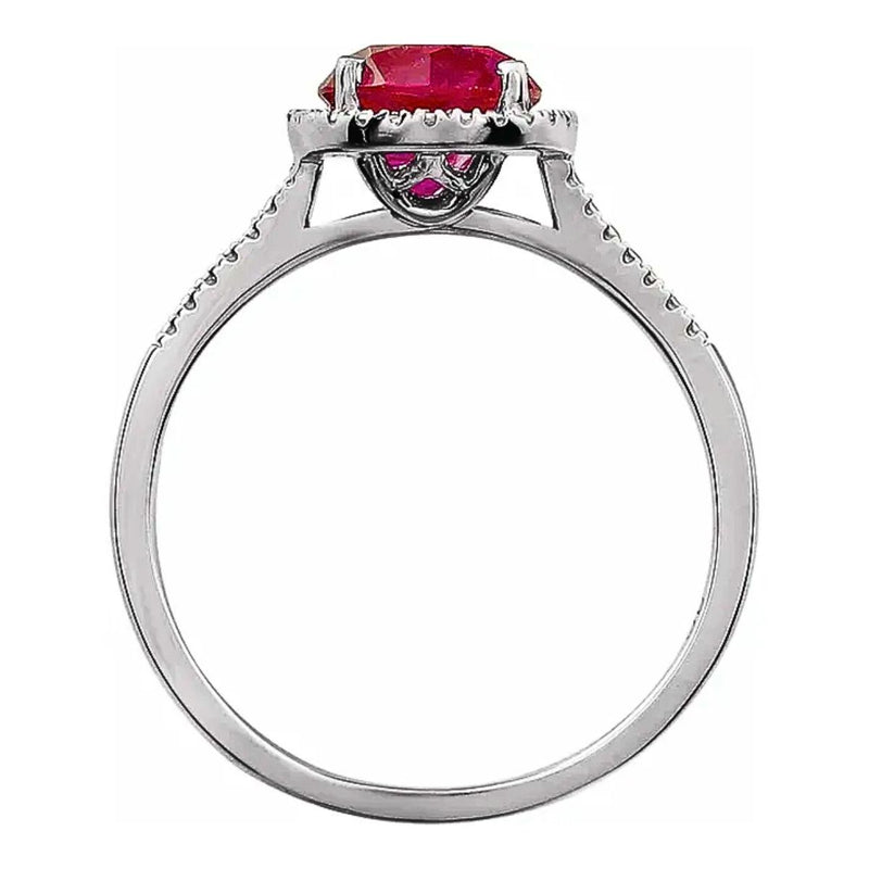 Side view of our lab-created ruby and beaded halo with diamond accents, shows the quality of this birthstone ring in Sterling Silver. Available from Jewels of St Leon.