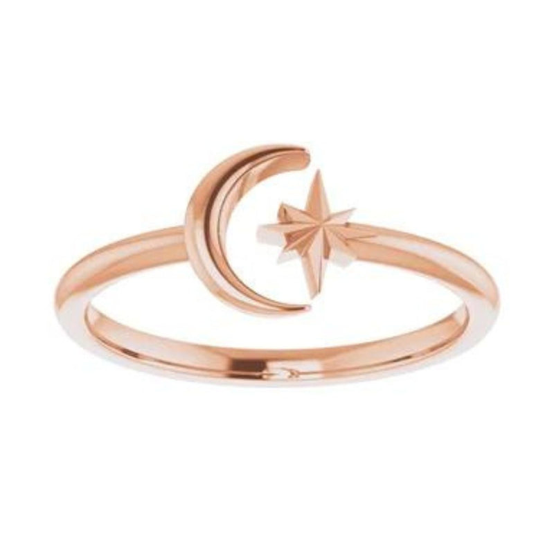 The Crescent Moon and Star Ring in 14K Rose Gold is a stunning example of the beauty that can be achieved through negative space. This ladies&