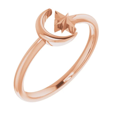 The Crescent Moon and Star Ring in 14K Rose Gold is a stunning example of the beauty that can be achieved through negative space. This ladies' gold ring is expertly crafted with intricate attention to detail, creating an elegant and unique fashion accessory.  Part of the 302 Fine Jewellery Cosmos Collection, its delicate crescent moon and star design, it is a piece that will add a touch of celestial charm to any outfit.