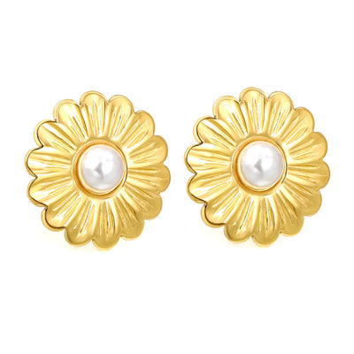 Front-facing shot of two 25 mm gold-plated daisy earrings with glossy white pearl centres against a clean white backdrop.