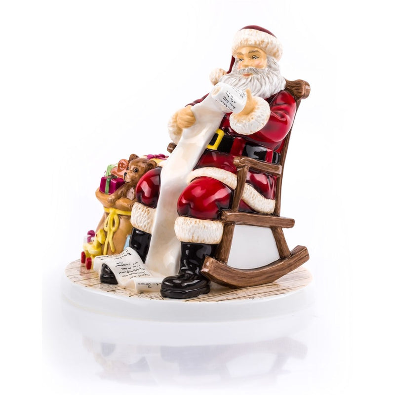 Hand-painted Dear Santa fine bone china figurine with Santa in rocking chair checking list