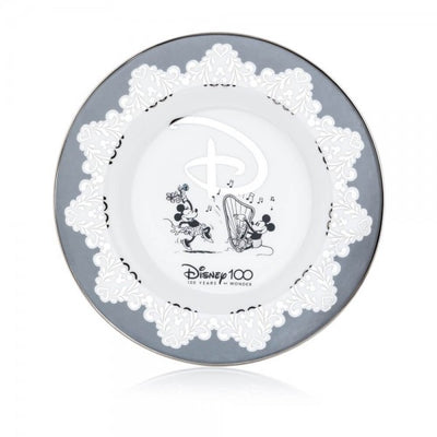The Disney100 Mickey and Minnie Plate is made from fine bone china and decorated with real platinum detailing. The plate has beautiful old-school sketches of Mickey and Minnie in the centre. The Disney100 Mickey and Minnie Collector's Plate is a must-have in your collection! Buy Now from Jewels of St Leon Australia.