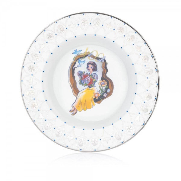 On the Disney100 Snow White plate, there is the imagery of the Princess in the middle of the plate, sitting with flowers and birds flying around, capturing the nostalgic feeling you get from watching the film. If you look hard enough, you can see the number 100 placed within the imagery. Buy now from Jewels of St Leon.
