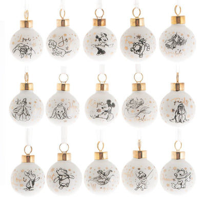 A beautiful collection of 15 mini Disney baubles featuring beloved characters like Mickey, Minnie, Winnie, Tigger, Eeyore, Dumbo, Ariel, Tinkerbell, and Simba. Each ceramic bauble is adorned with gold lettering and glitter ribbons, perfect for your tree.